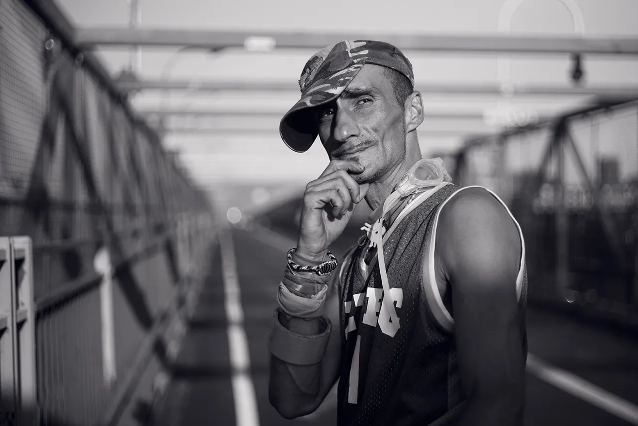 Black and white photo of a biker